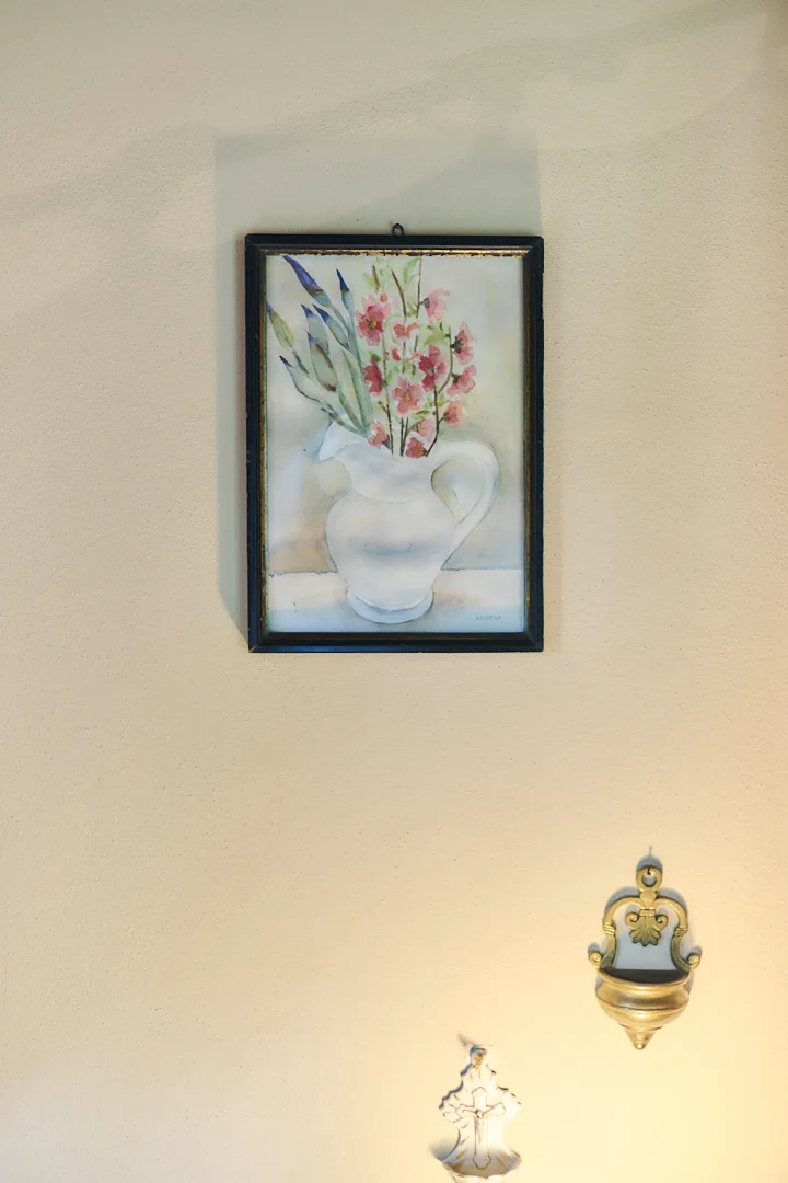 Framed floral artwork inside Villa Niccolai