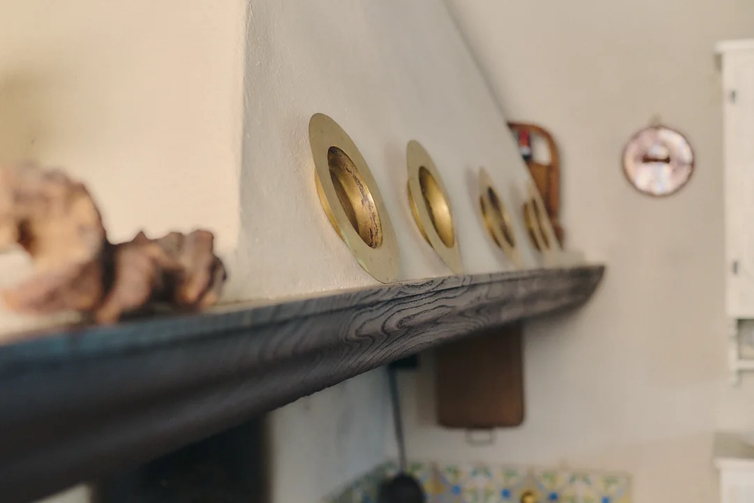 Historic kitchen mantel detail at Villa Niccolai
